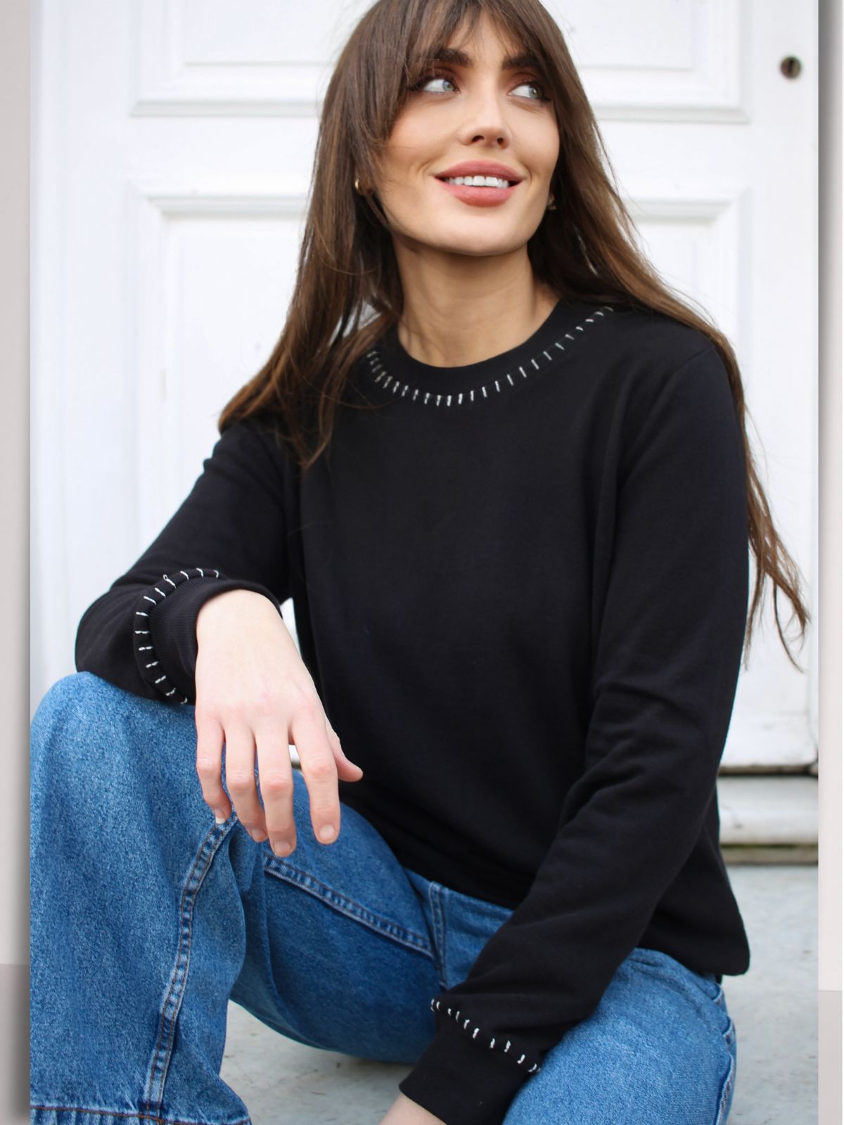 black fine knit lightweight sweater with contract blanket stitch