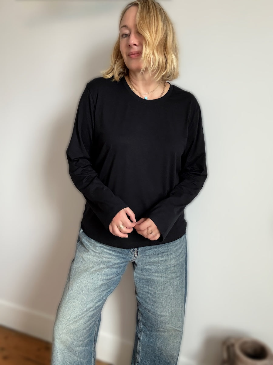 black long sleeve organic cotton top.