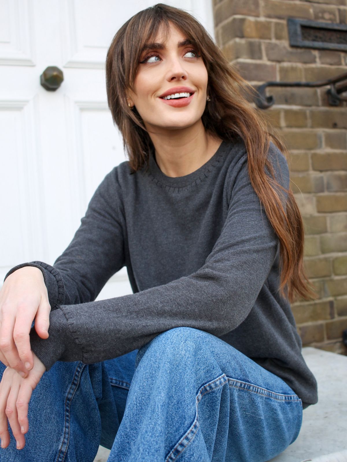 Charcoal fine knit light weight sweatshirt with black blanket stitch