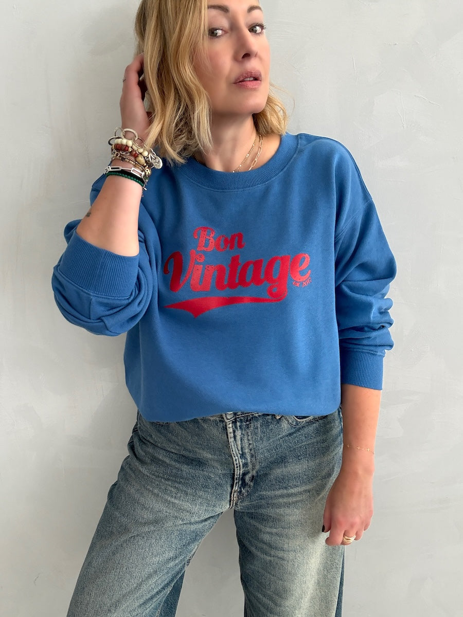 blue crewneck sweatshirt organic cotton with red slogan print